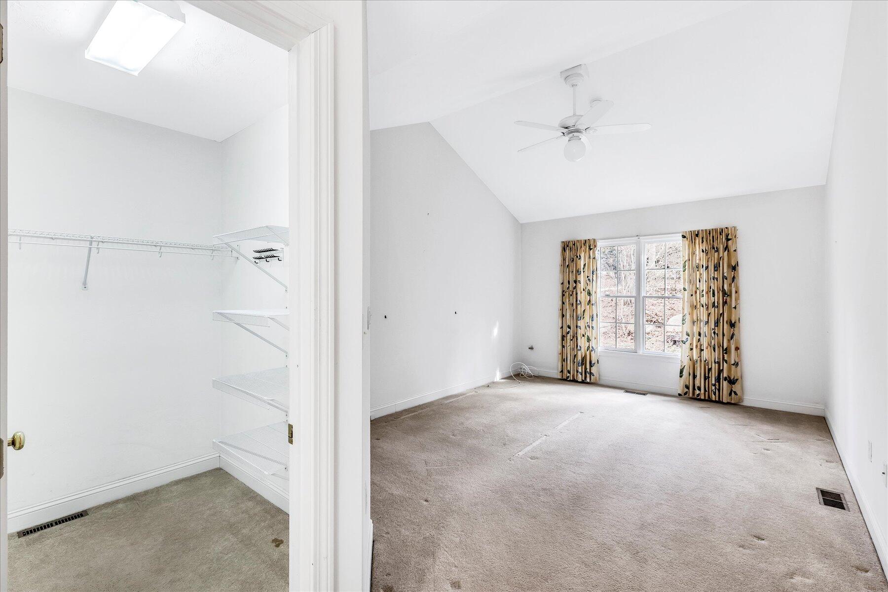 14 Bishops Park Mashpee, MA 02649 - Photo 21 of 42 a view of an empty room with a window