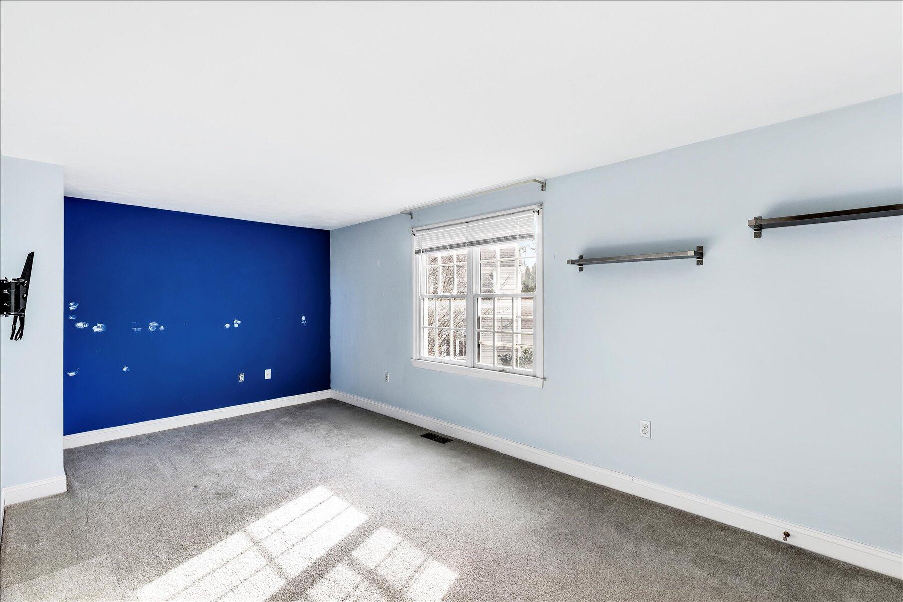 14 Bishops Park Mashpee, MA 02649 - Photo 30 of 42 a view of a livingroom with a window