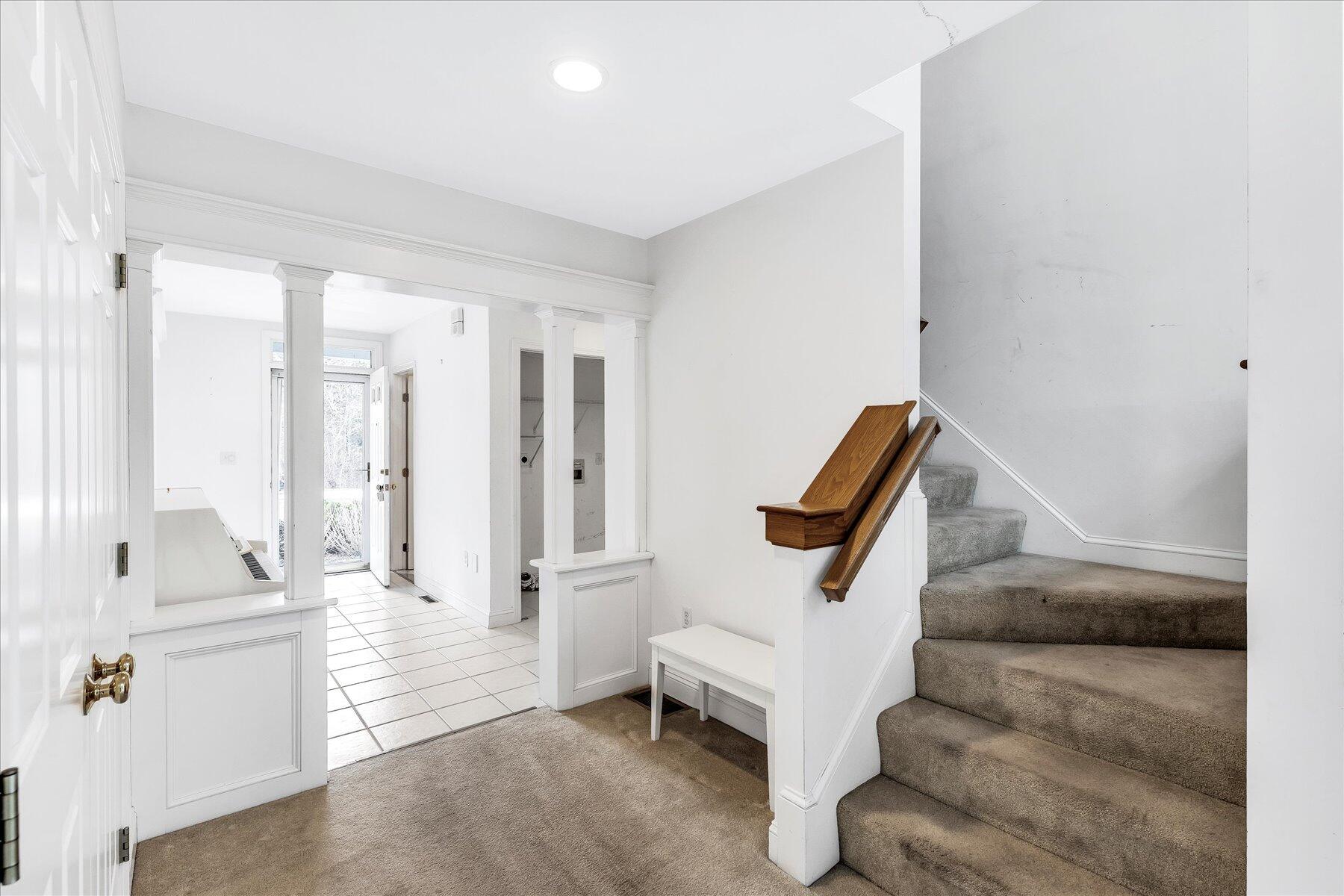 14 Bishops Park Mashpee, MA 02649 - Photo 4 of 42 a living room with furniture and a potted plant