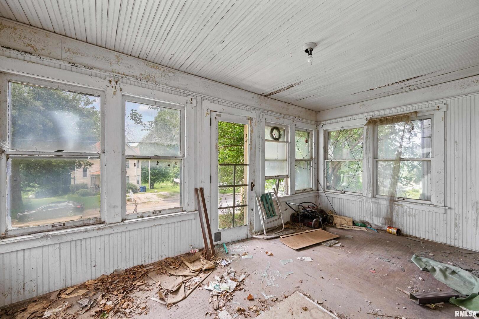 307 Walcott Street Dixon, IA 52745 - Photo 3 of 6 a living room with a large window