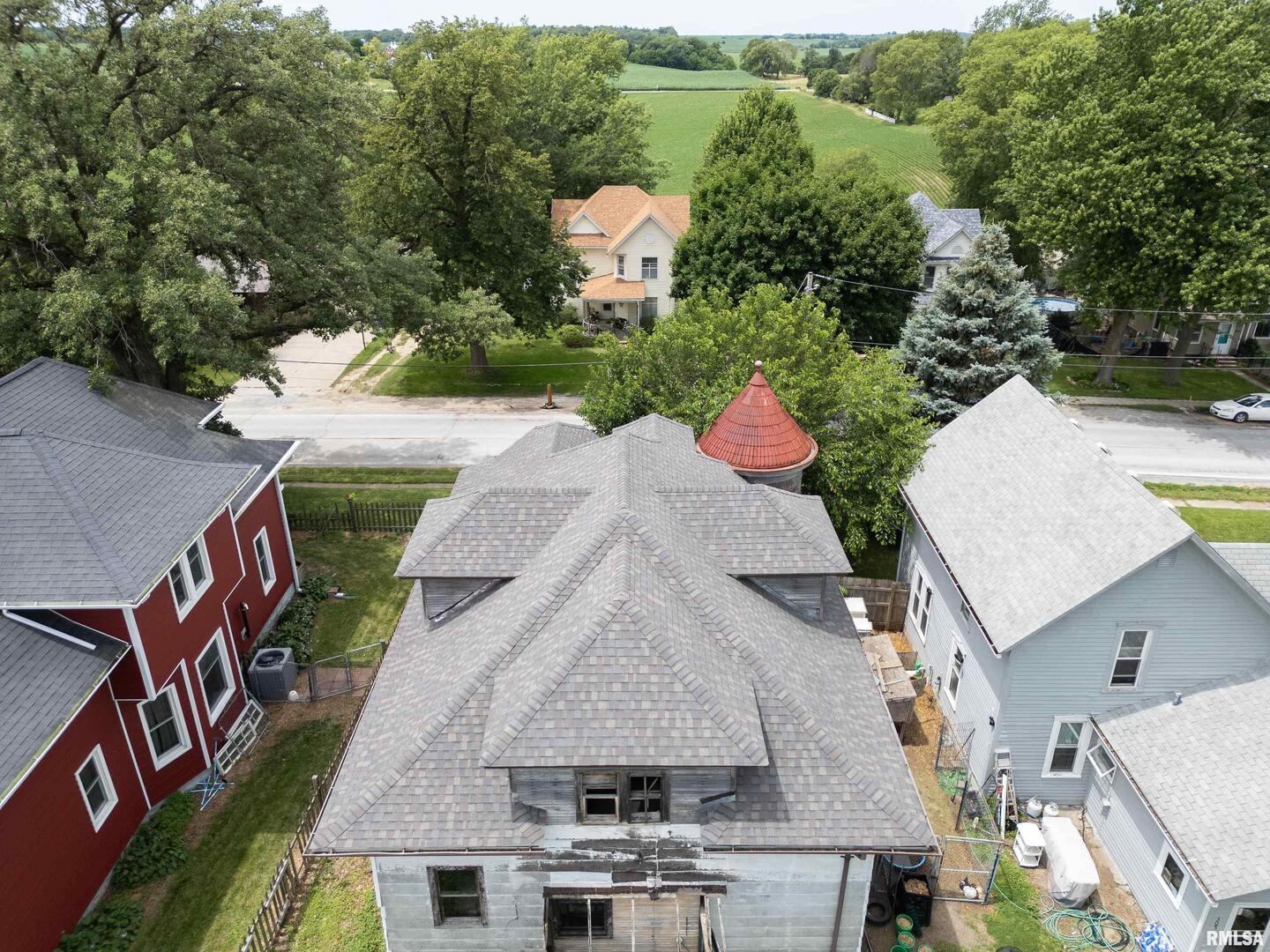 307 Walcott Street Dixon, IA 52745 - Photo 4 of 6 an aerial view of a house with yard swimming pool and outdoor seating