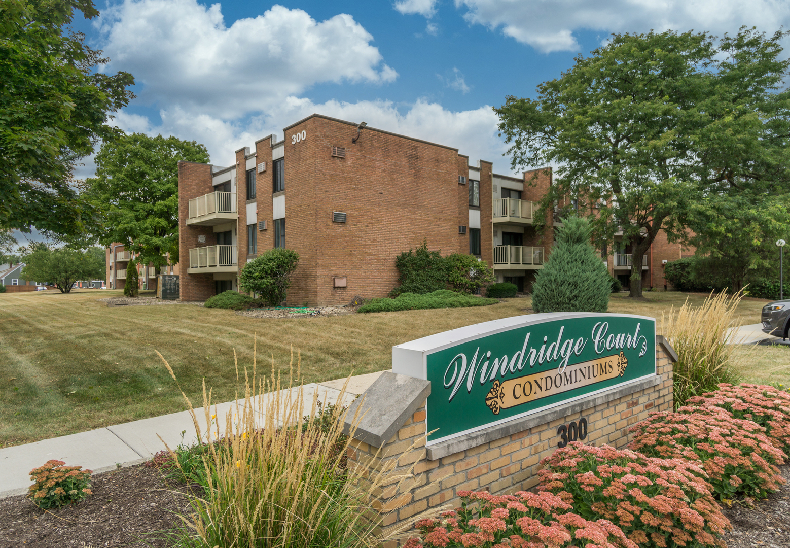 300 West Fullerton Avenue, Unit 305 Addison, IL 60101 - Photo 2 of 18 a view of a street with a building in the background