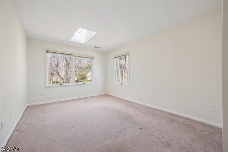 20 Alexandria Way Bernards, NJ 07920 - Photo 15 of 26 an empty room with windows