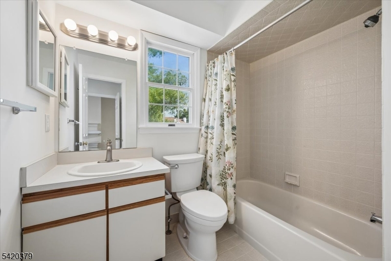20 Alexandria Way Bernards, NJ 07920 - Photo 16 of 26 a bathroom with a sink a toilet and shower