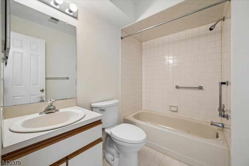 20 Alexandria Way Bernards, NJ 07920 - Photo 21 of 26 a bathroom with a sink toilet and shower