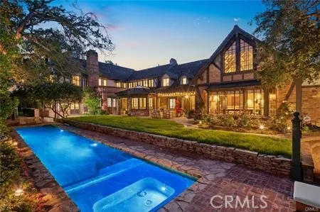 a view of a house with a yard porch and sitting area
