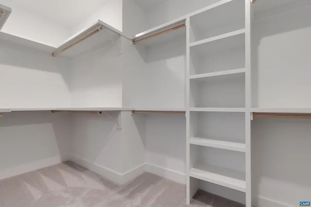 a view of an empty walk in closet