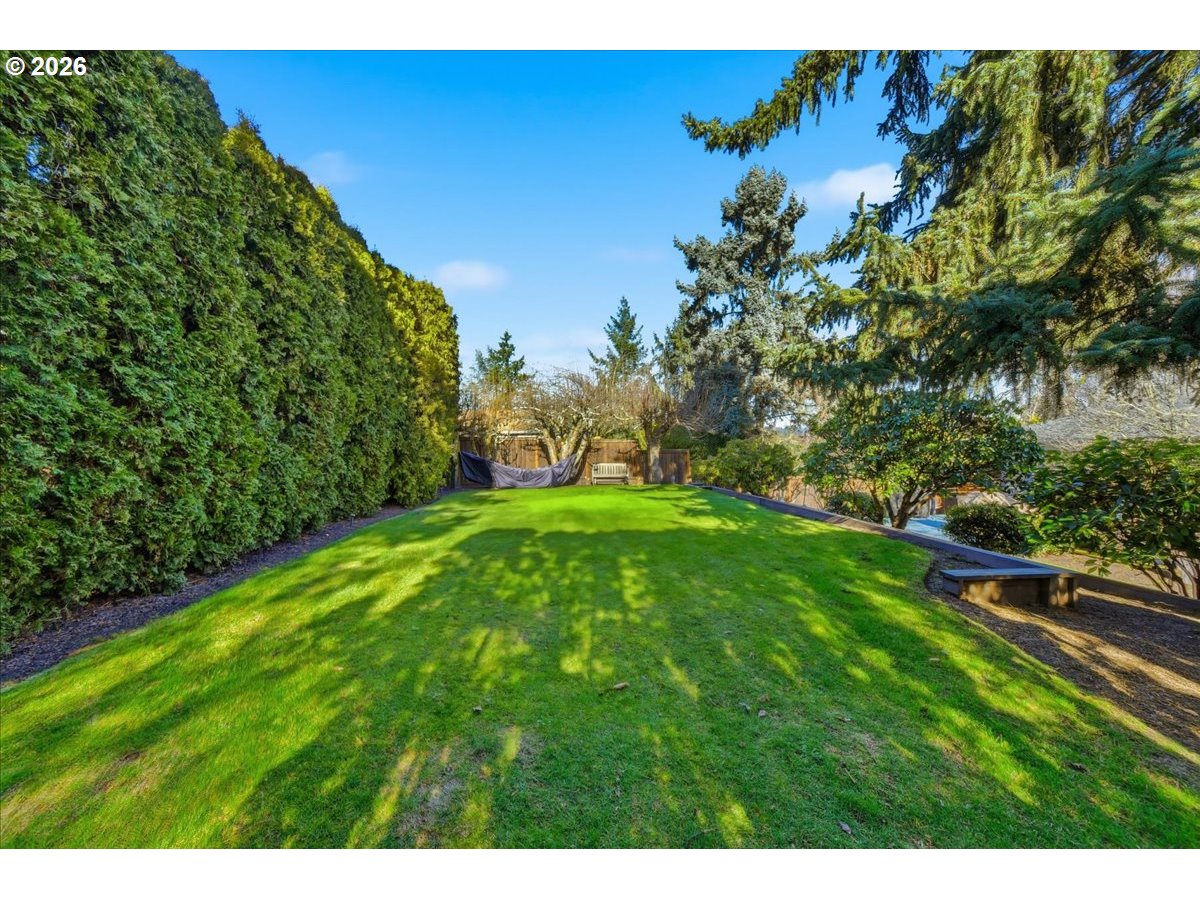 10339 Southwest 40th Avenue Portland, OR 97219 - Photo 32 of 37 a view of a garden with an outdoor space