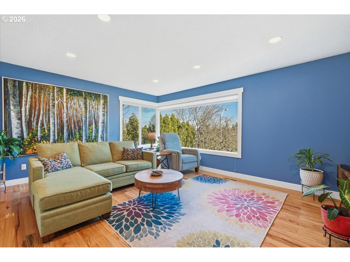10339 Southwest 40th Avenue Portland, OR 97219 - Photo 6 of 37 a living room with furniture and a large window