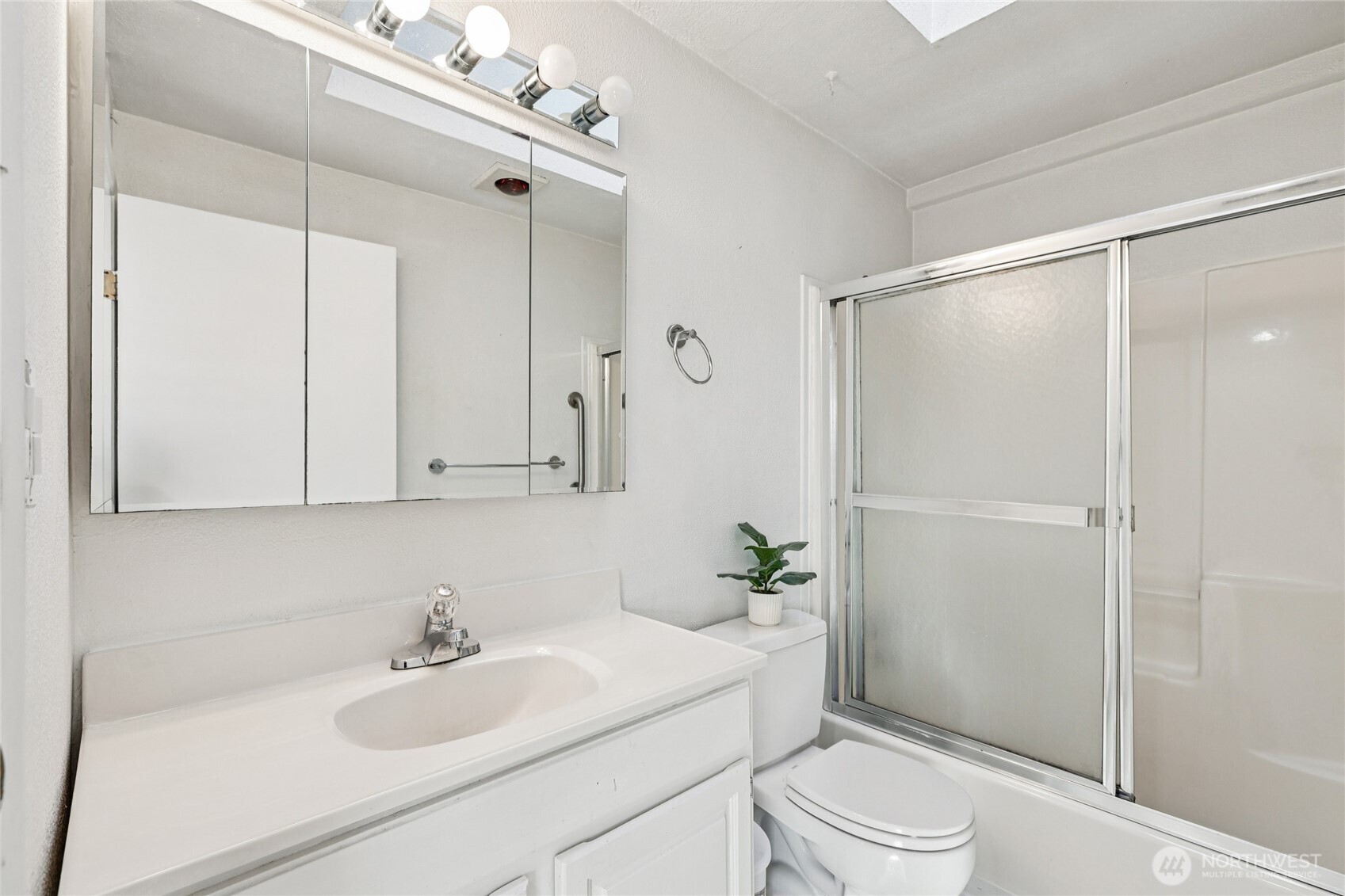 2434 Southwest 328th Street Federal Way, WA 98023 - Photo 13 of 19 a bathroom with a sink toilet and shower