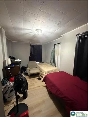 a room with gym equipment and a window
