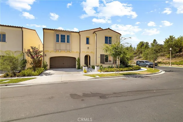 a view of a house with basketball court
