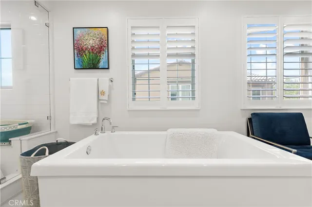 a bathroom with a bathtub and a sink