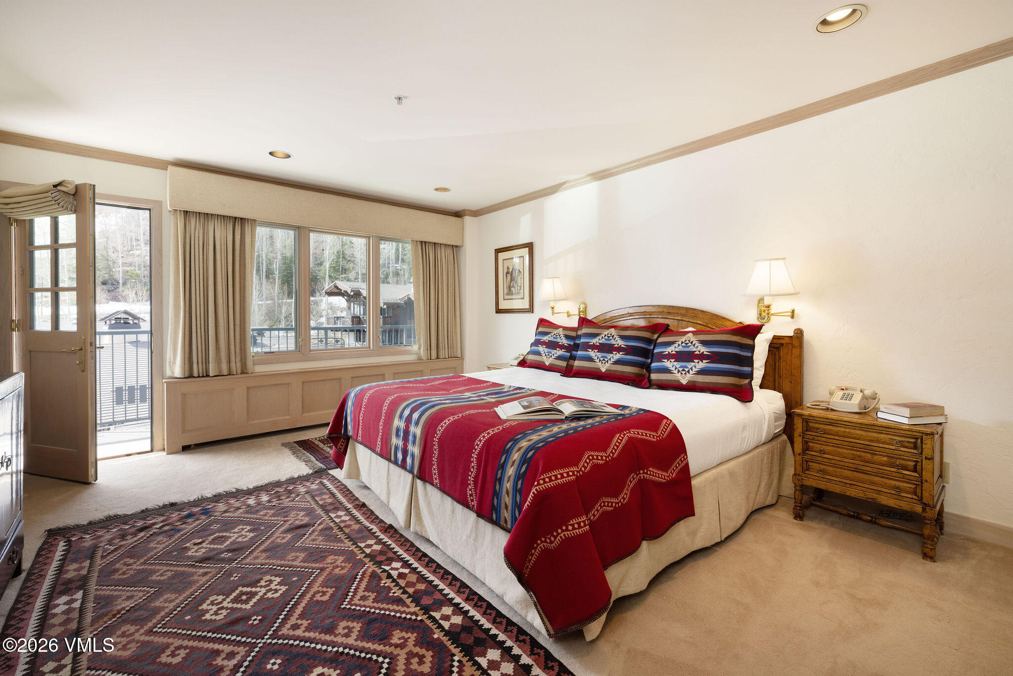 200 Vail Road, Unit 799 Vail, CO 81657 - Photo 13 of 32 a bedroom with a bed and a large window