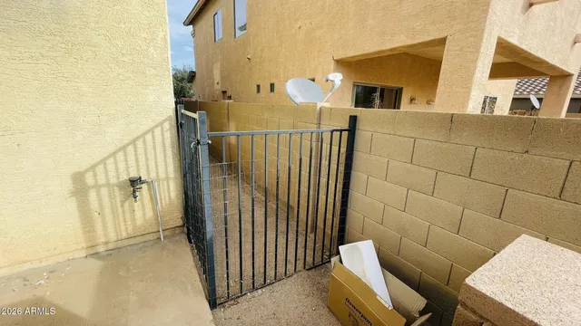 a view of a swimming pool with a plant