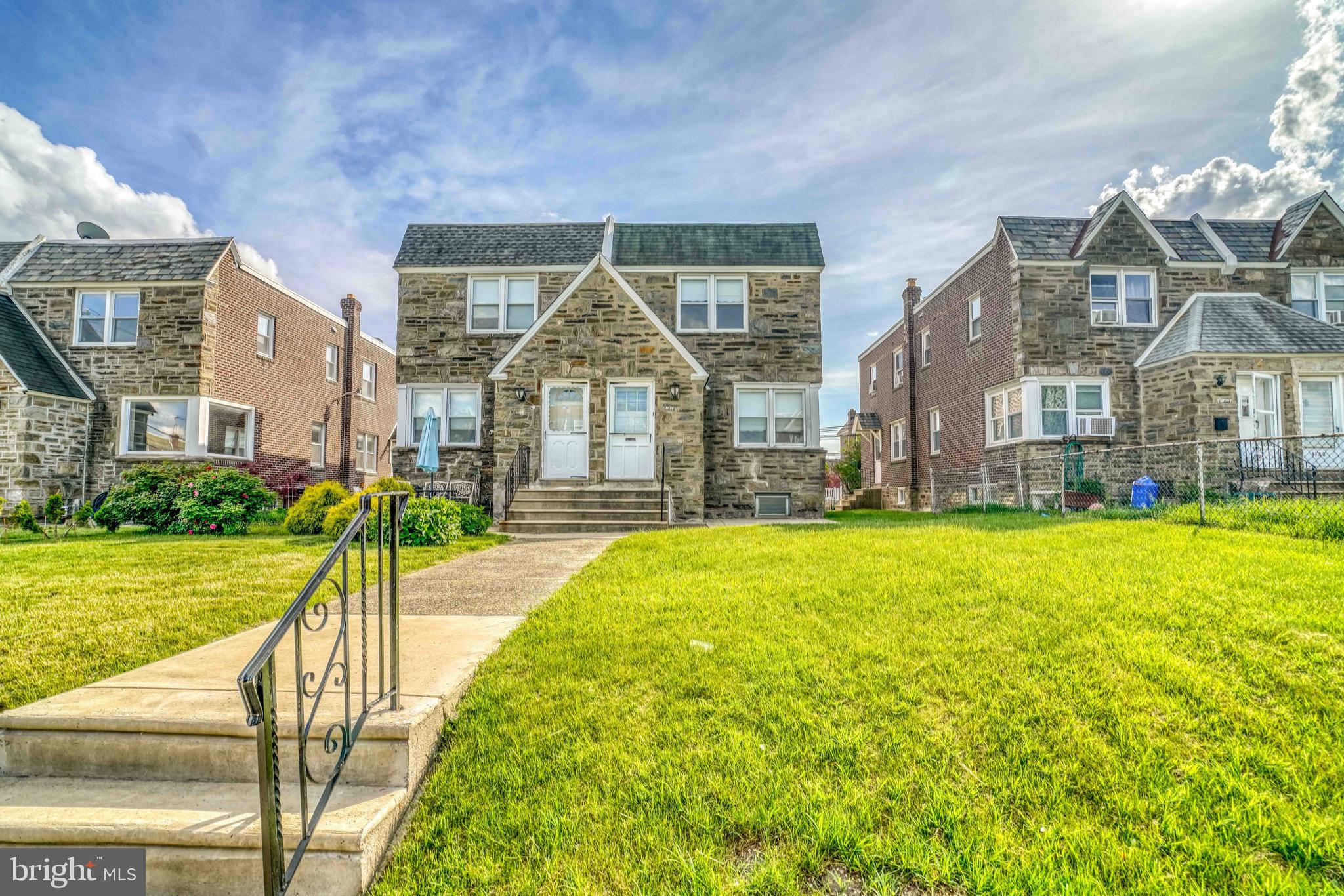 1136 Kerper Street Philadelphia, PA 19111 - Photo 1 of 41 a view of an house with backyard and swimming pool
