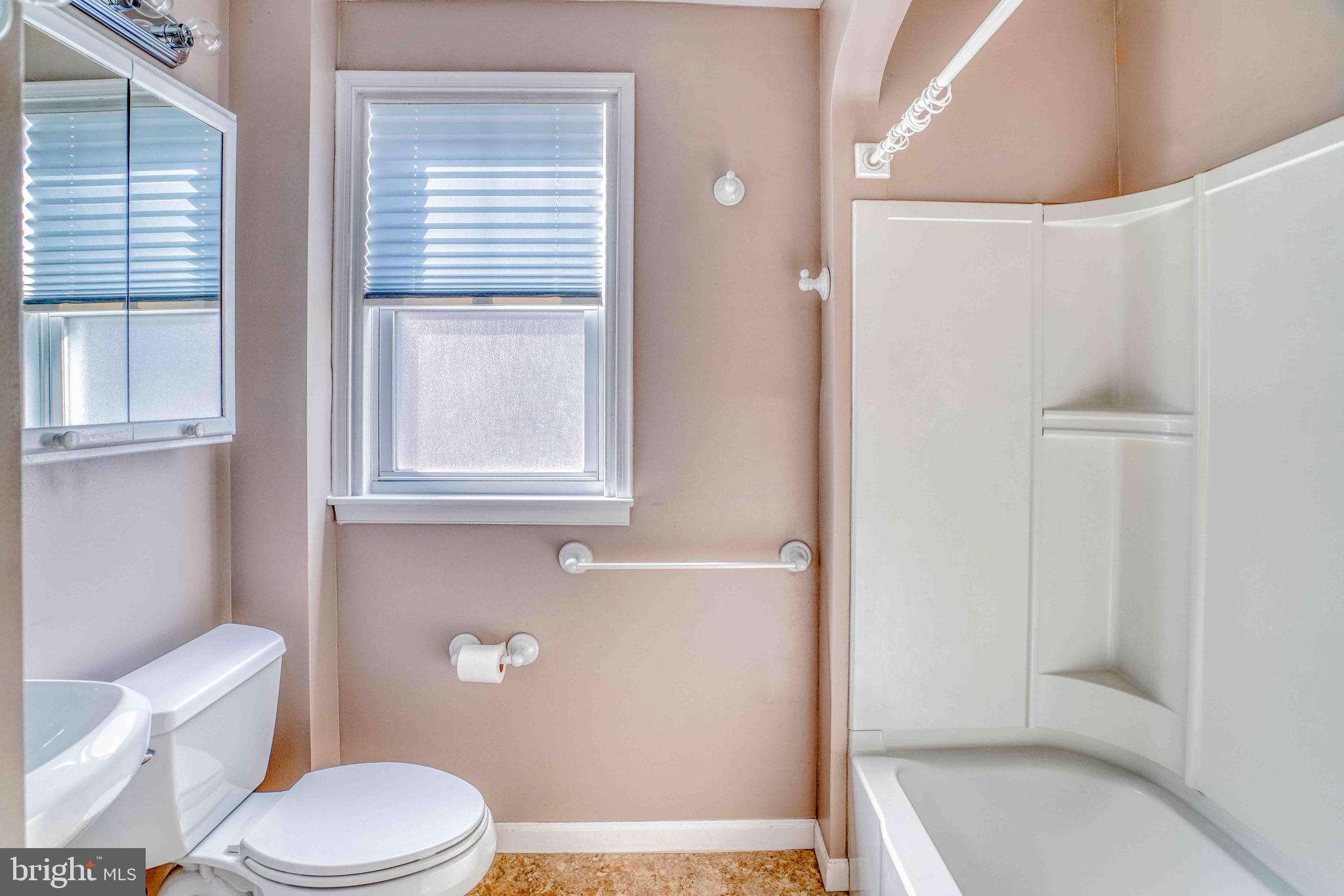 1136 Kerper Street Philadelphia, PA 19111 - Photo 20 of 41 a bathroom with a toilet and a shower