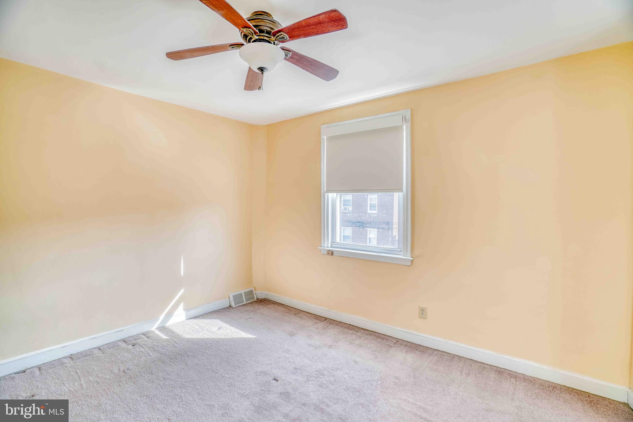 1136 Kerper Street Philadelphia, PA 19111 - Photo 29 of 41 an empty room with windows and fan
