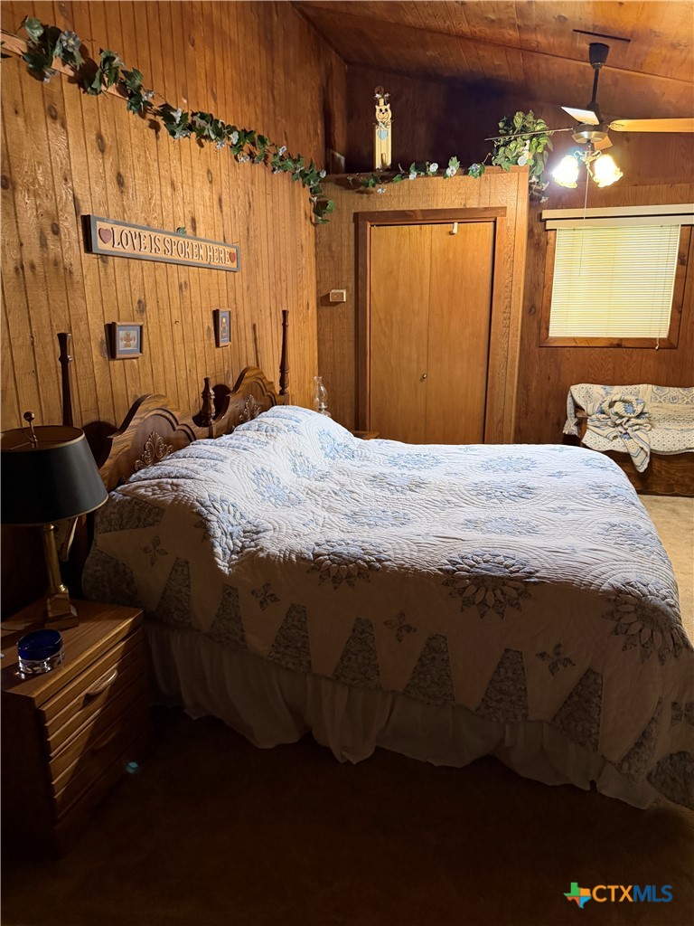 57 John Tillery Road Port Lavaca, TX 77979 - Photo 28 of 34 a bedroom with a bed and a mirror