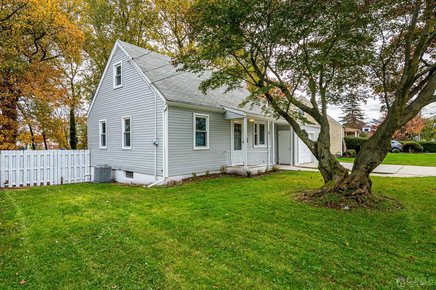 99 Old Post Road Edison, NJ 08817 - Photo 3 of 40 a view of a house with a yard