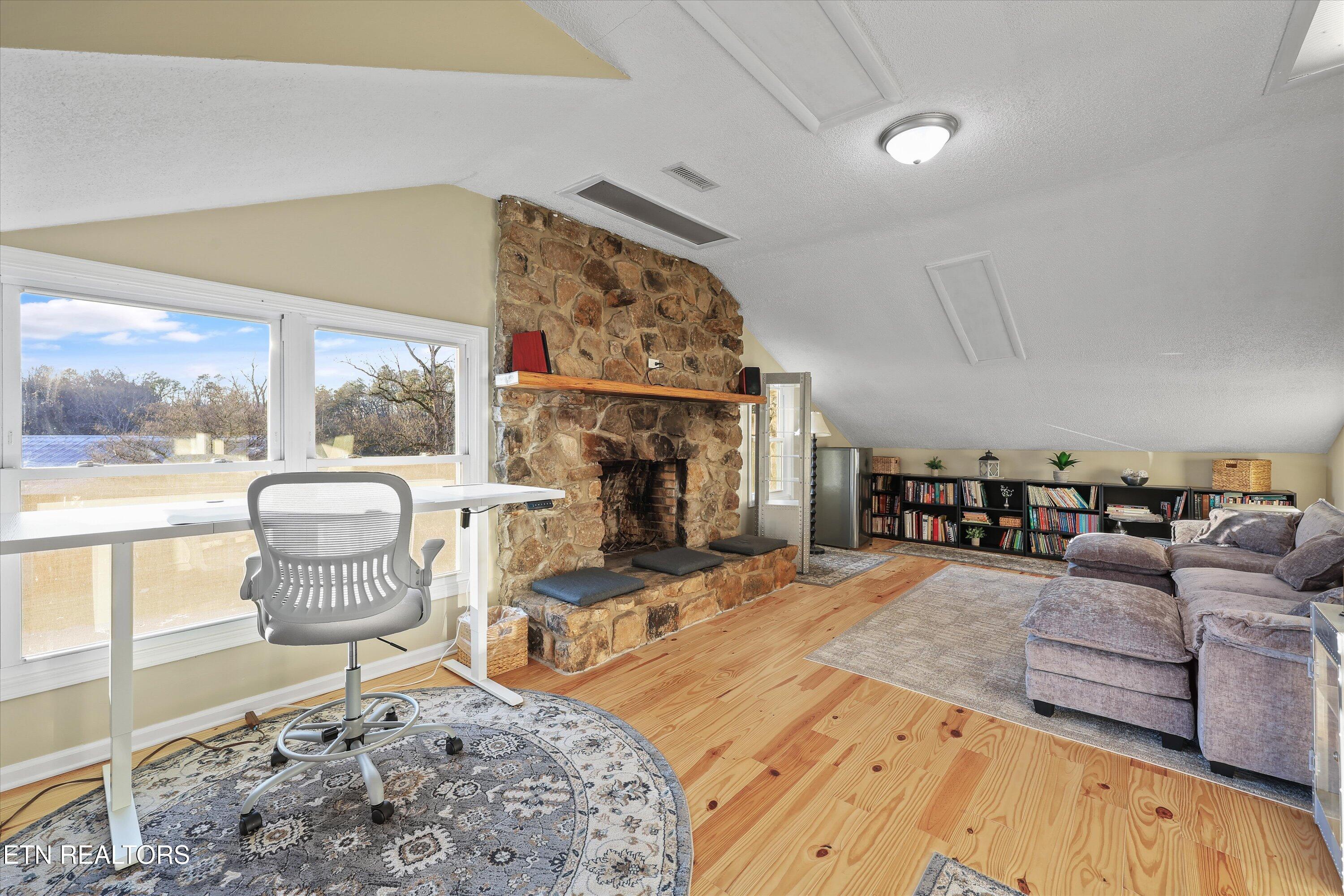 7969 Glendale Community Road Greenback, TN 37742 - Photo 38 of 56 2nd level family room w fireplace