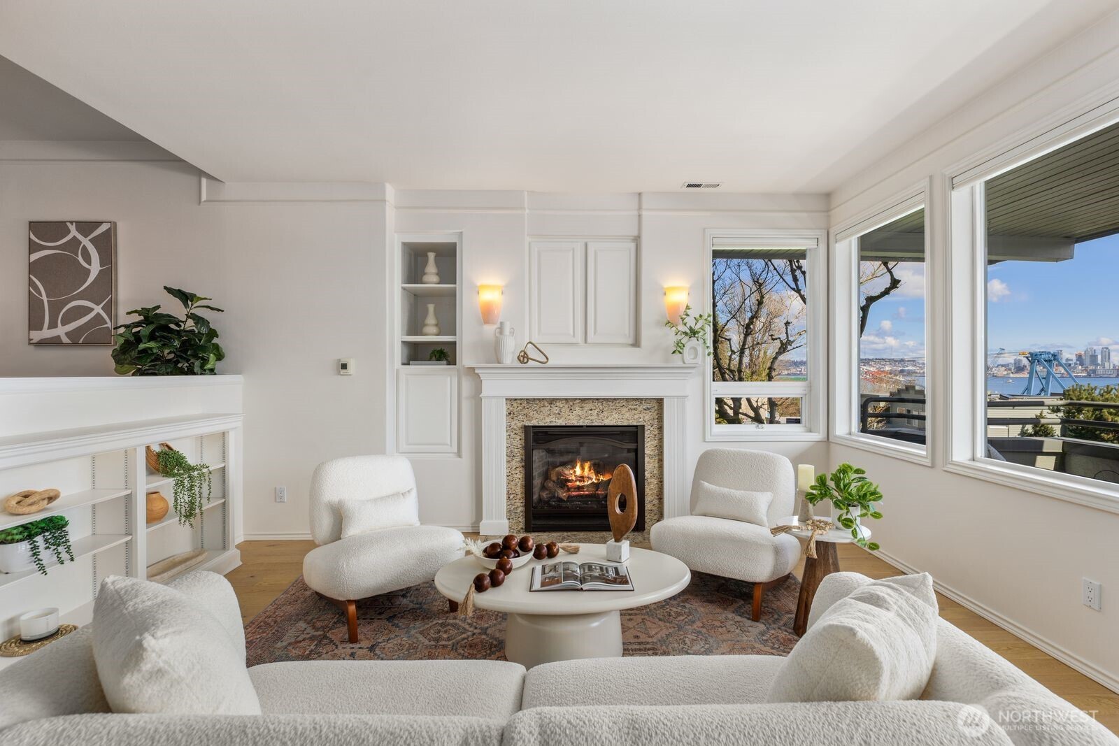 2349 Harbor Avenue Southwest, Unit 701 Seattle, WA 98126 - Photo 14 of 39 a living room with furniture and a fireplace