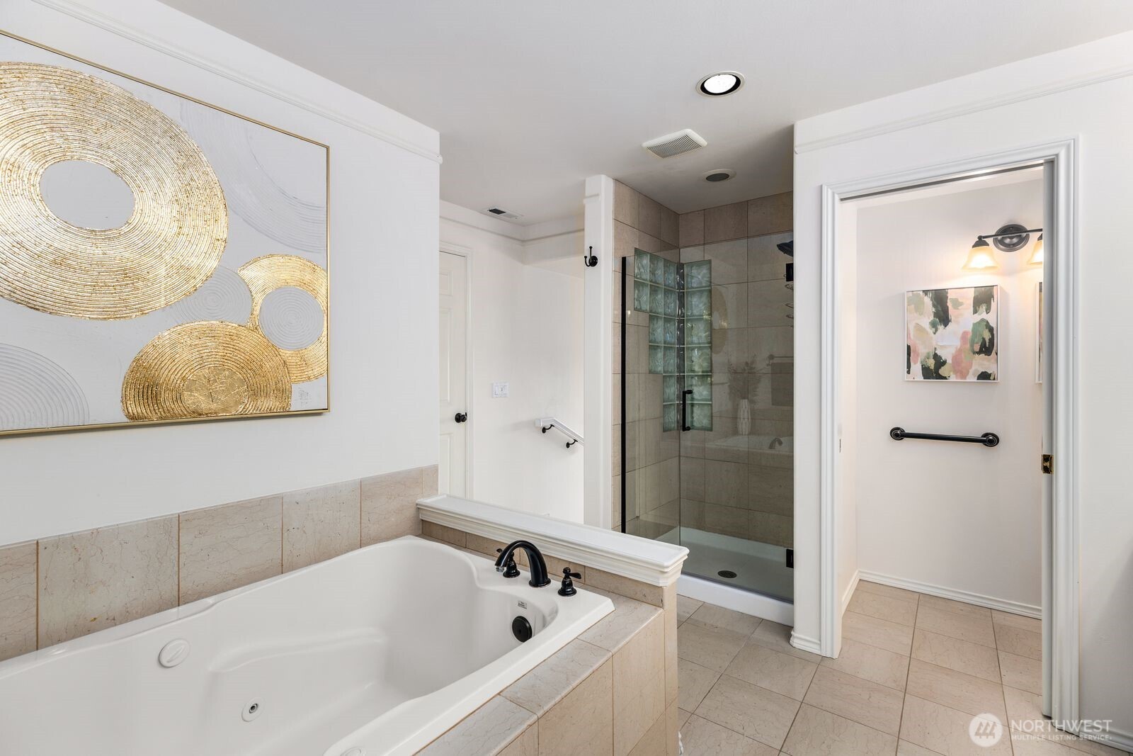 2349 Harbor Avenue Southwest, Unit 701 Seattle, WA 98126 - Photo 25 of 39 a bathroom with a bathtub and a shower