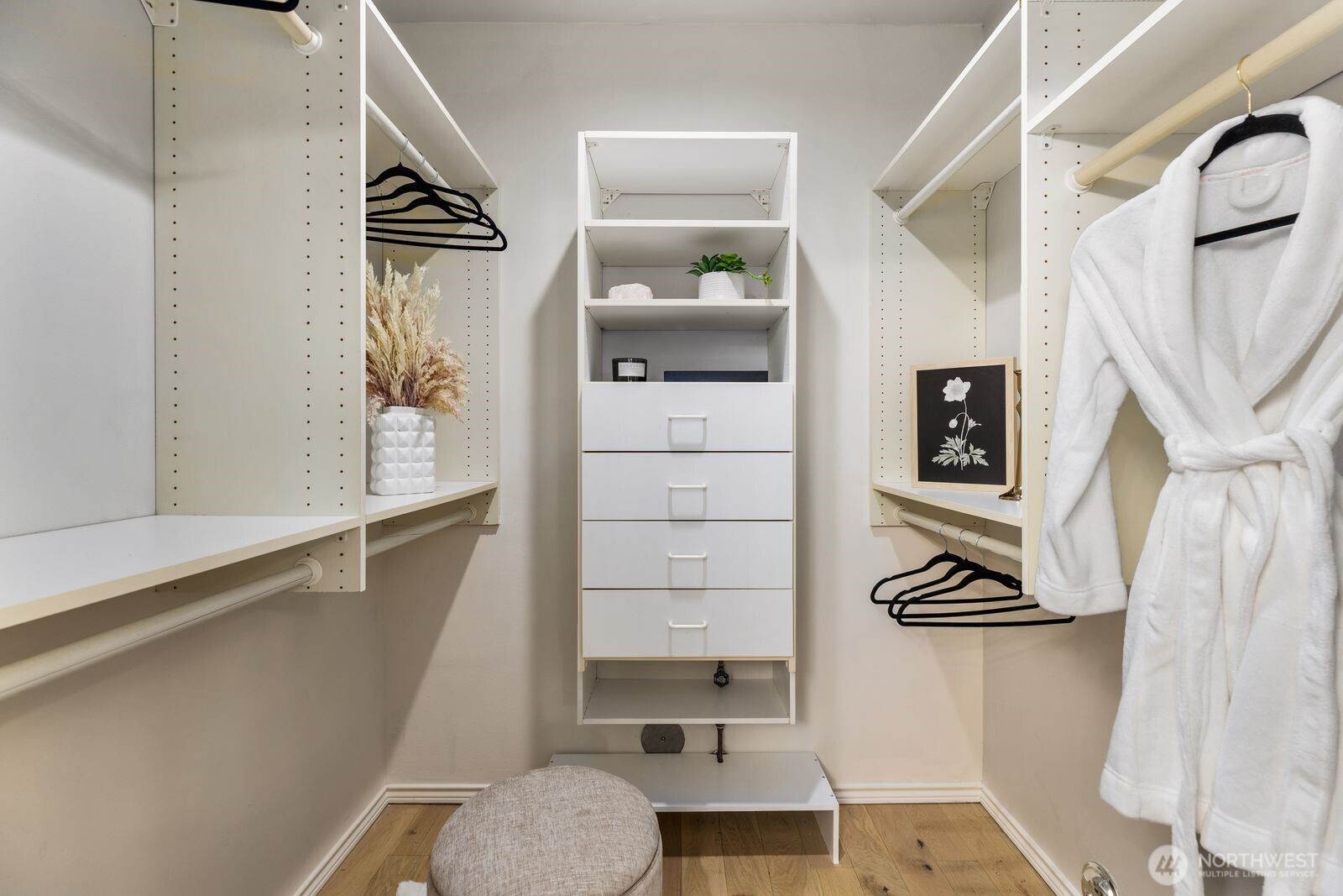 2349 Harbor Avenue Southwest, Unit 701 Seattle, WA 98126 - Photo 27 of 39 a view of walk in closet with clothes and shoes