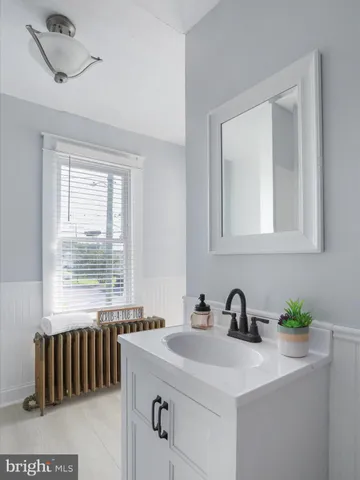 a kitchen with a sink and a window