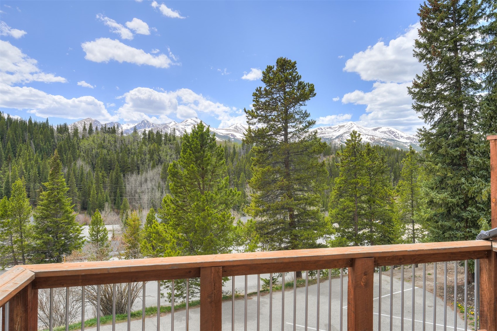 132 Illinois Gulch Road, Unit 3 Breckenridge, CO 80424 - Photo 16 of 32 a view of a lake from a balcony