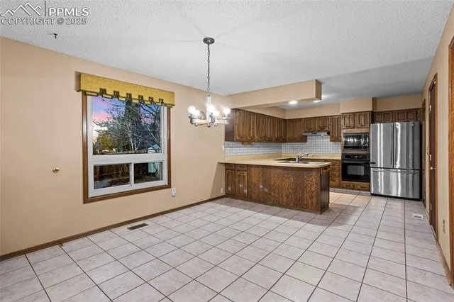 $570,000 | 2430 Zane Circle, Colorado Springs, CO 80909