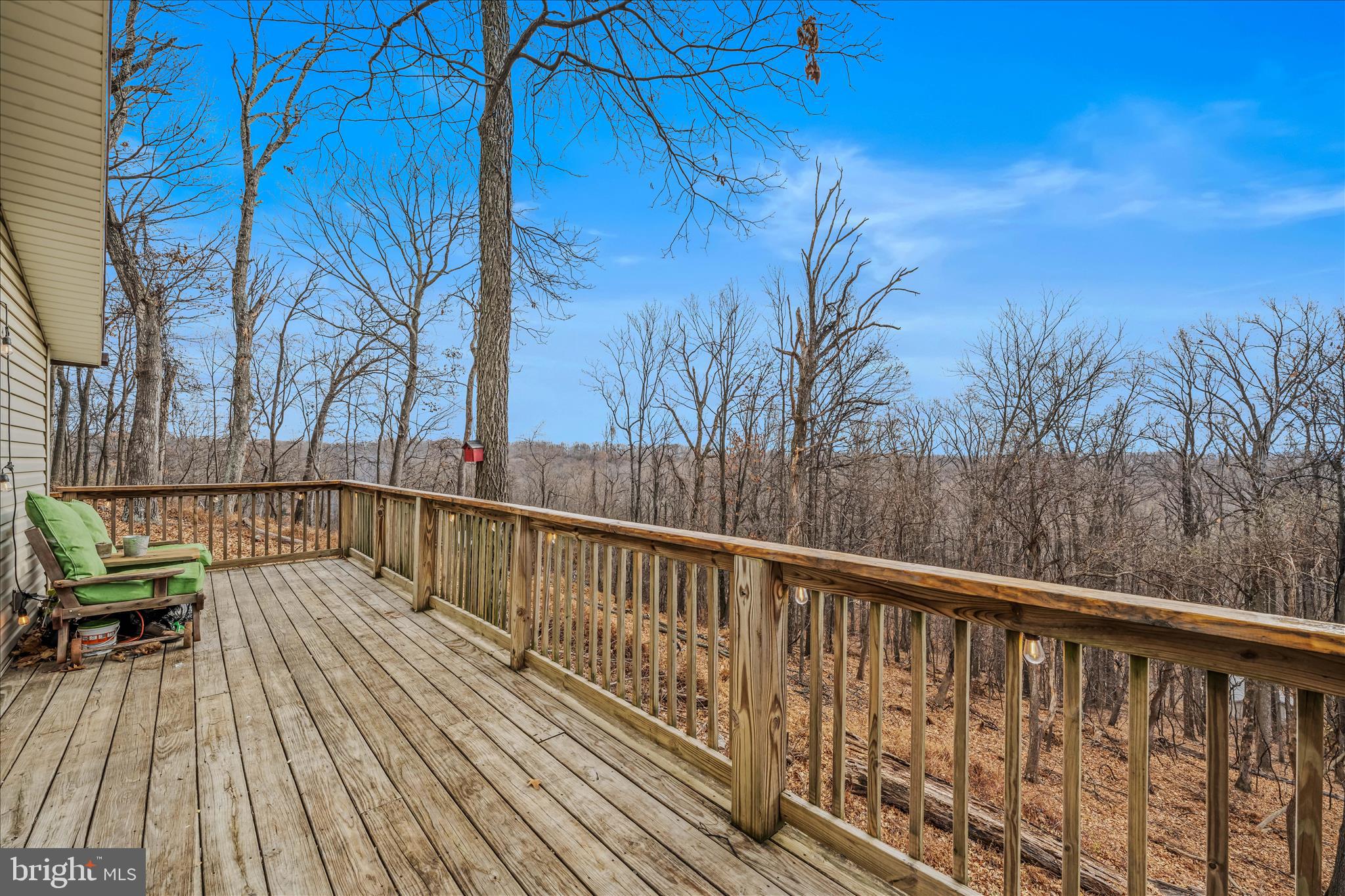 384 Trapper Ridge Lane Hedgesville, WV 25427 - Photo 13 of 52 a view of balcony with wooden floor and fence
