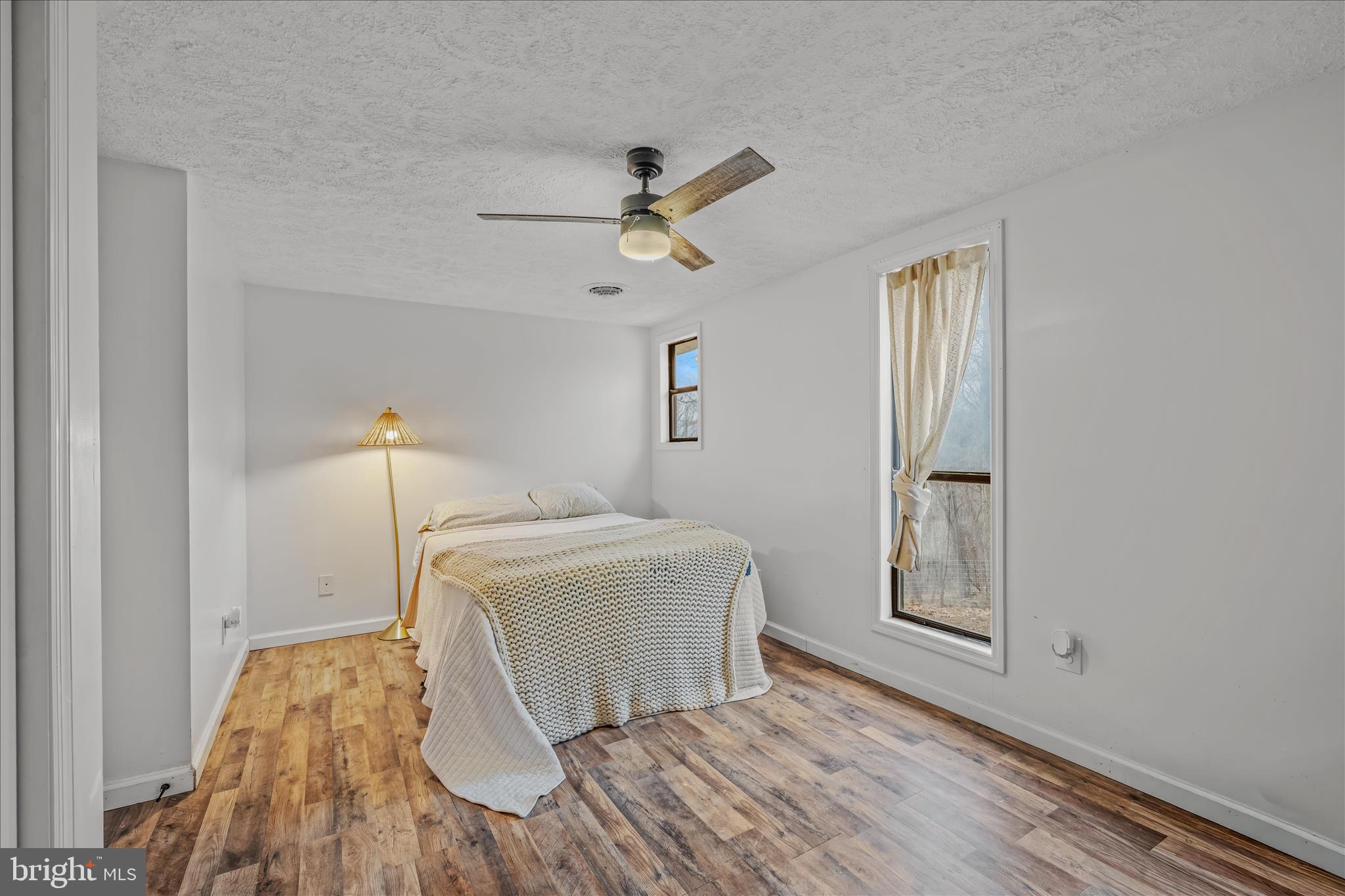 384 Trapper Ridge Lane Hedgesville, WV 25427 - Photo 20 of 52 a bedroom with a bed and a window