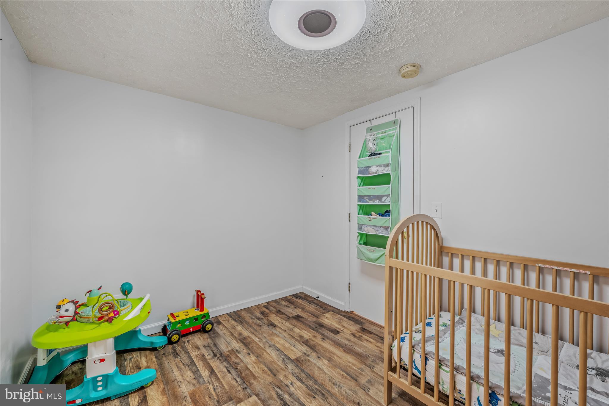 384 Trapper Ridge Lane Hedgesville, WV 25427 - Photo 24 of 52 a bedroom with a bed and a window