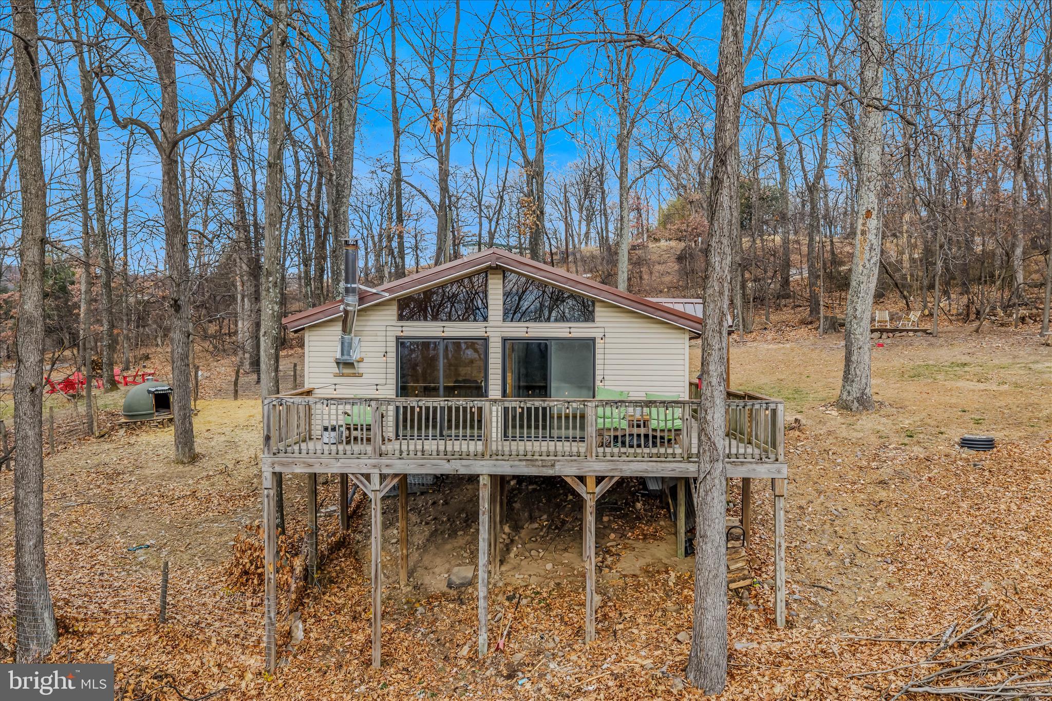384 Trapper Ridge Lane Hedgesville, WV 25427 - Photo 3 of 52 a front view of a house with a yard