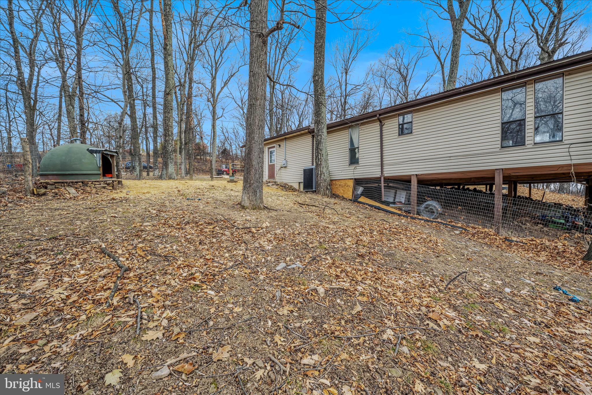 384 Trapper Ridge Lane Hedgesville, WV 25427 - Photo 32 of 52 a house view with a backyard space