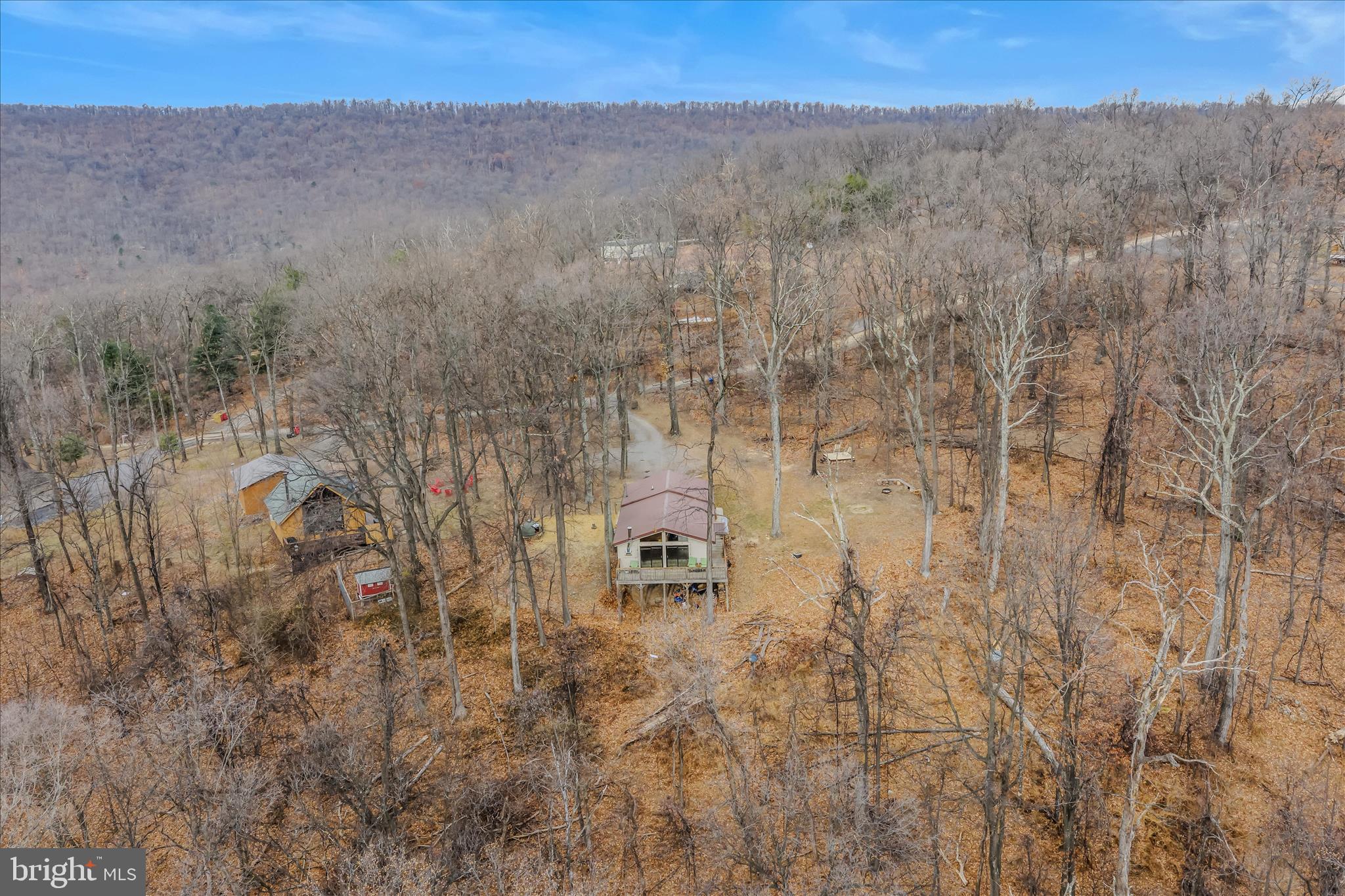 384 Trapper Ridge Lane Hedgesville, WV 25427 - Photo 37 of 52 a view of a dry yard with trees