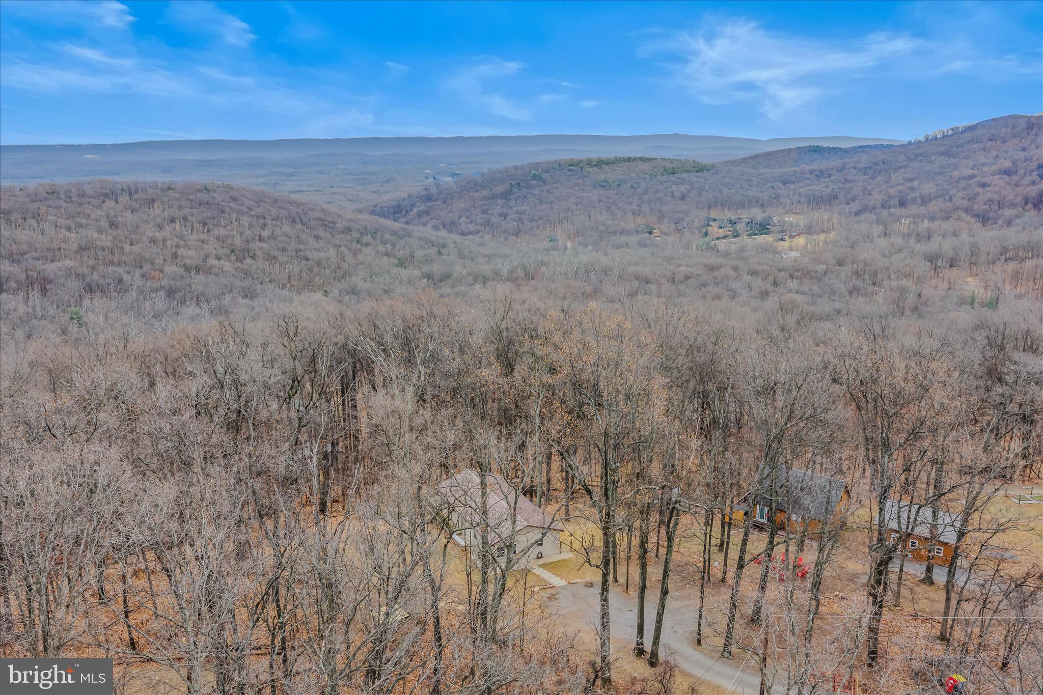 384 Trapper Ridge Lane Hedgesville, WV 25427 - Photo 41 of 52 a view of a dry field with wooden fence