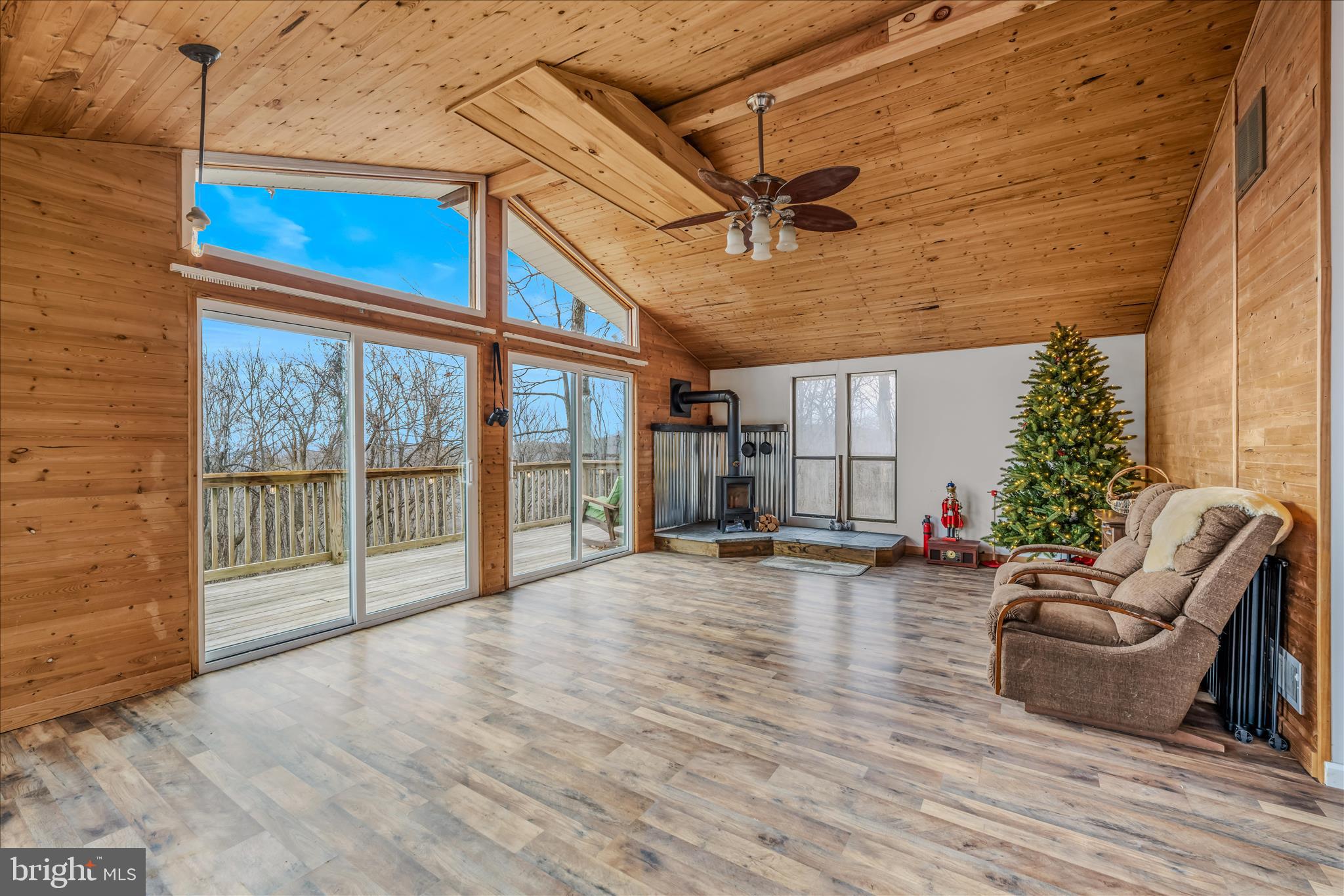 384 Trapper Ridge Lane Hedgesville, WV 25427 - Photo 5 of 52 a view of a livingroom with furniture and floor to ceiling window