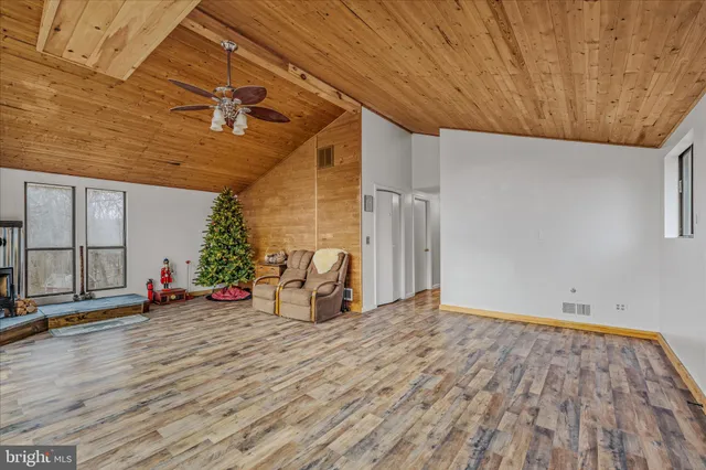 a view of a livingroom with hardwood floor