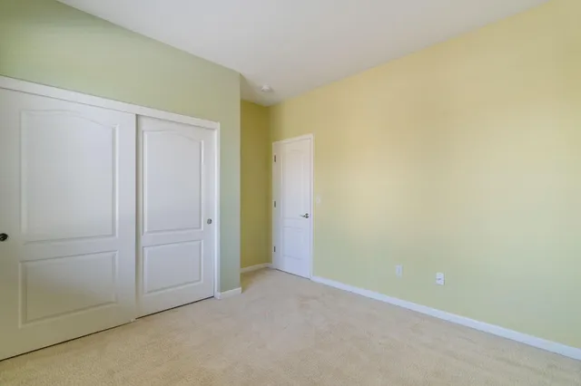 a bathroom with a sink toilet a mirror and shower