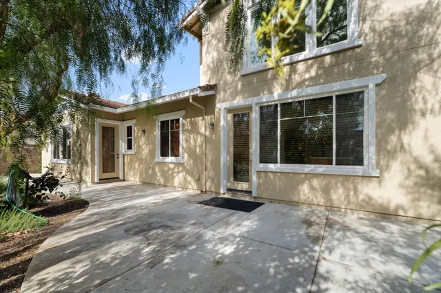 a view of a balcony with chairs