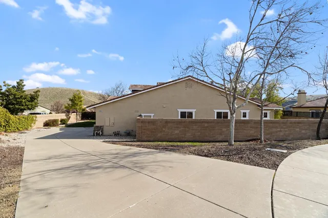 a house view with a outdoor space