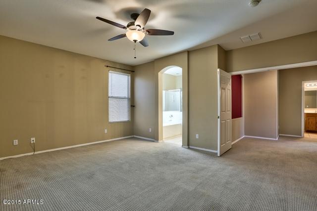 13652 West Calavar Road Surprise, AZ 85379 - Photo 5 of 39 Master_Bedroom_2.jpg