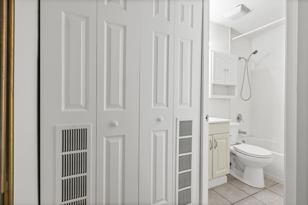 4 Depot Street Upton, MA 01568 - Photo 14 of 26 a bathroom with a toilet and a shower