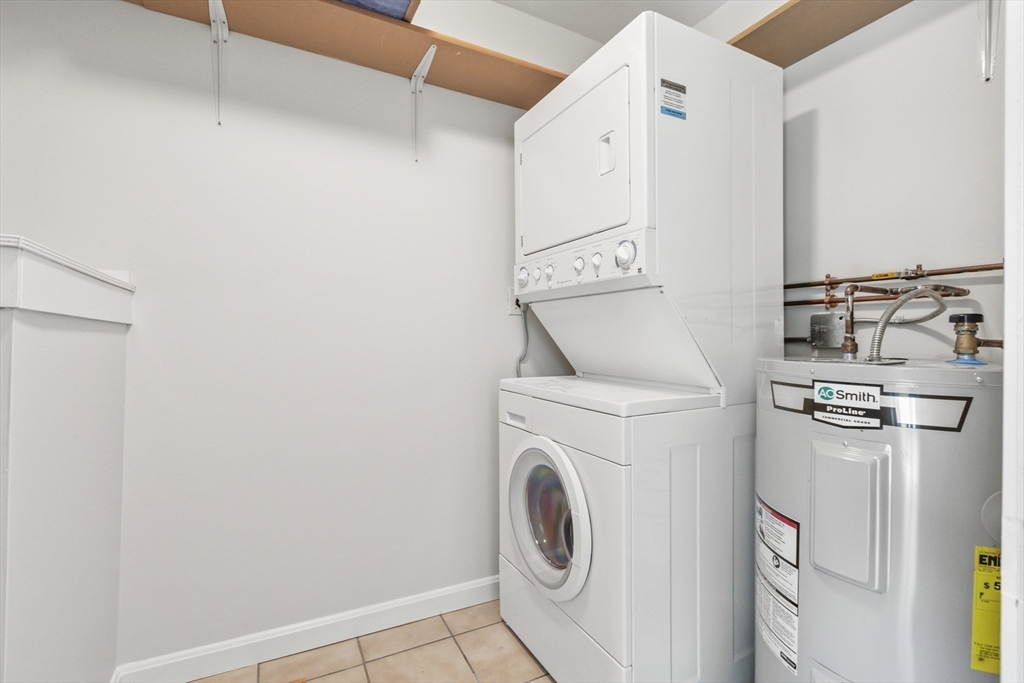 4 Depot Street Upton, MA 01568 - Photo 22 of 26 a utility room with dryer and washer