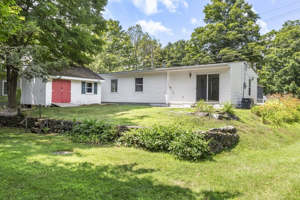 4 Depot Street Upton, MA 01568 - Photo 24 of 26 a front view of house with yard and green space