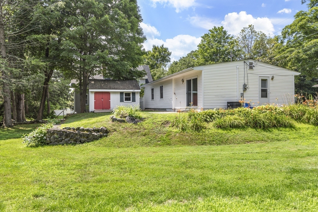 4 Depot Street Upton, MA 01568 - Photo 26 of 26 a front view of a house with a yard