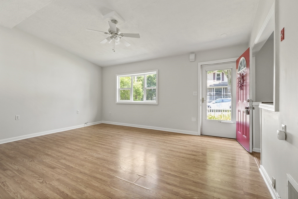 4 Depot Street Upton, MA 01568 - Photo 4 of 26 a view of an empty room with a window