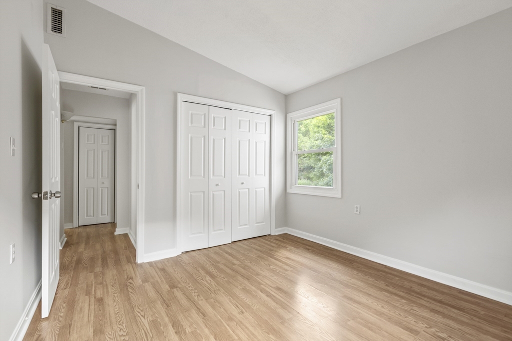 4 Depot Street Upton, MA 01568 - Photo 10 of 26 a view of empty room with wooden floor and fan